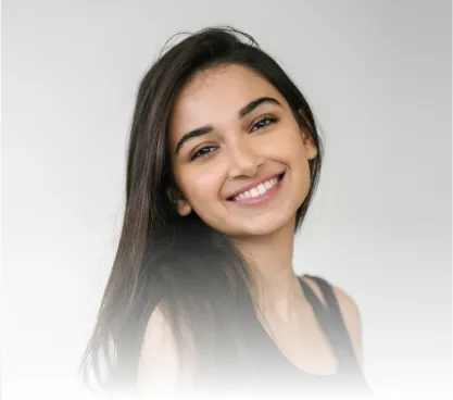 Woman with dark hair smiling
